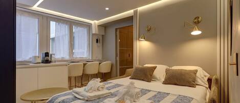 1 chambre, fer et planche à repasser, draps fournis