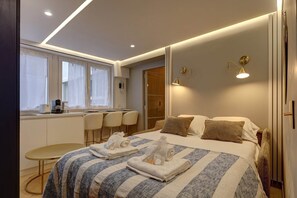 1 bedroom, desk, iron/ironing board, bed sheets