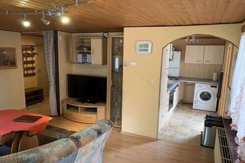 Holz-Ferienhaus mit Wintergarten