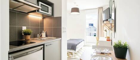 Studio | Private kitchen | Fridge, microwave, stovetop, dining tables