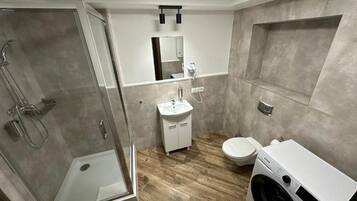 Hair dryer, towels, soap, shampoo