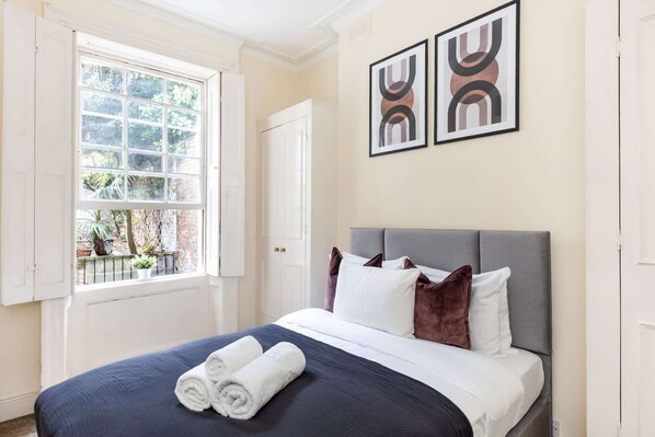 1 bedroom, desk, iron/ironing board, travel cot