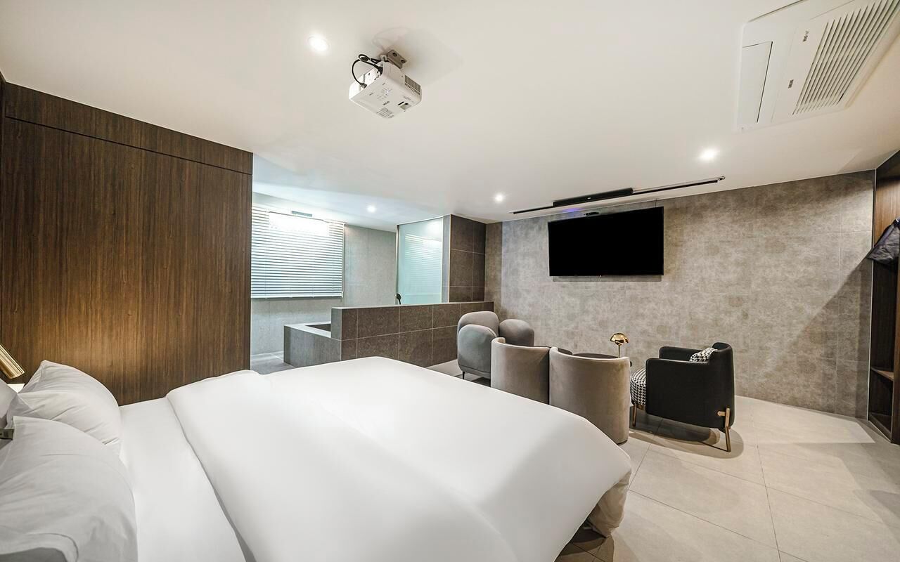 Royal Studio Suite | Premium bedding, memory foam beds, individually decorated, desk