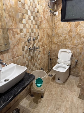 Shower, towels, soap, shampoo