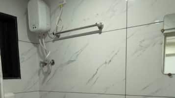 Triple Room, Air conditioning | Bathroom | Shower, free toiletries, towels, soap