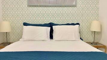 2 dormitorios, tabla de planchar con plancha, wifi gratis y ropa de cama
