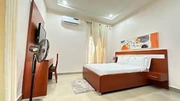 Economy Apartment, Balcony, City View | Desk, laptop workspace, blackout drapes, soundproofing