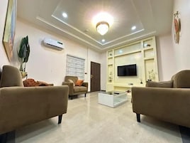 Apartamento Deluxe, balcón, vistas a la ciudad | Zona de estar