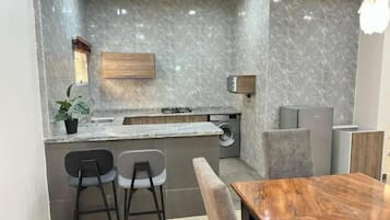 Deluxe Apartment, Balcony, City View | Private kitchenette