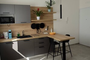 Fridge, microwave, coffee/tea maker, toaster