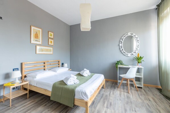 2 habitaciones y tabla de planchar con plancha 