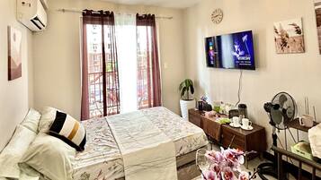 シグネチャー スタジオ ベッド (複数台) バルコニー シティビュー | 部屋からの景観