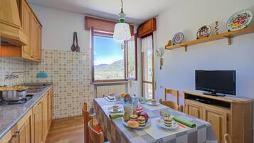 Apartamento familiar, varias habitaciones (A Due Passi Dal Bosco) | Comedor