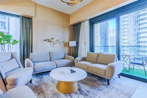 Luxury Apartment, Balcony, City View | Living area | 55-inch Smart TV with digital channels - Act One - Act Two - Downtown - Emaar (Dubai)