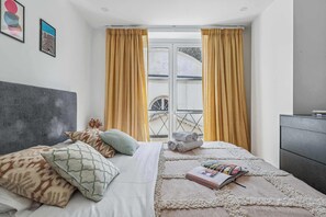 1 bedroom, desk, iron/ironing board, travel cot