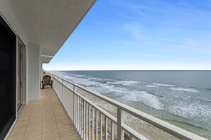 A balcony with a view of the ocean. - Paradise Point at the Opus (Daytona Beach Shores)