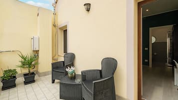 Habitación doble Deluxe, balcón, vista a la ciudad | Terraza o patio