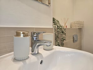 Hair dryer, towels, soap, toilet paper
