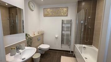 Hair dryer, towels, soap, shampoo