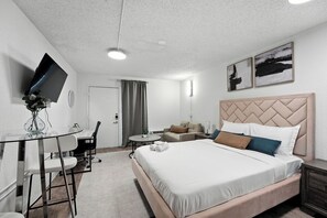 1 bedroom, desk, iron/ironing board, travel crib