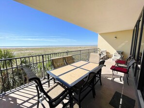 Outdoor dining - 2 Bedroom / 2 Bath Gulf Front Condo - 2nd Floor (Dauphin Island)