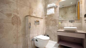Shower, free toiletries, slippers, towels