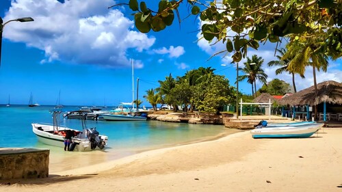 Welcome to our home away from home! Only 5 minutes walk from the beach & village