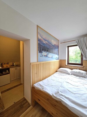 1 slaapkamer, een strijkplank/strijkijzer, wifi, beddengoed