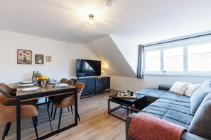 Living area - PrimeLoft "Above the rooftops" - Balcony - Old town - Families & groups - View (Goslar)