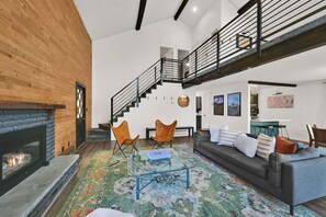 TV, fireplace, books, stereo