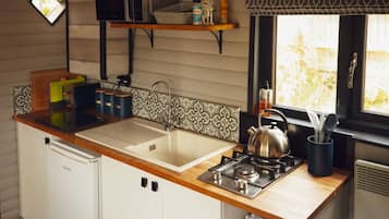 Microwave, stovetop, toaster, cookware/dishes/utensils
