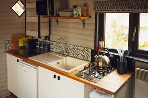 Microwave, stovetop, toaster, cookware/dishes/utensils