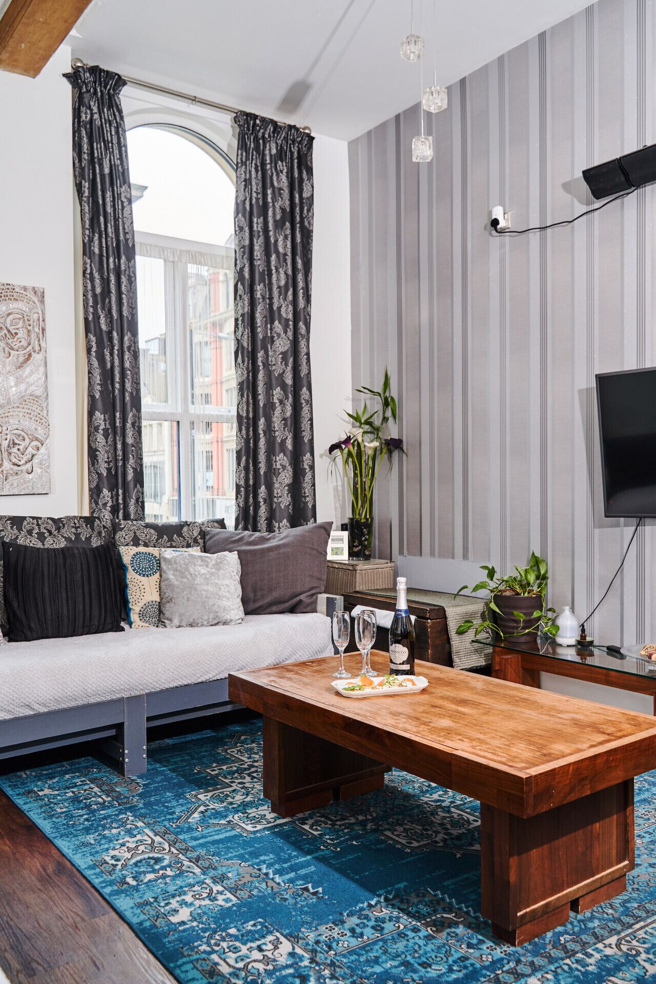 Lounge Delight: Spacious lounge with plush seating, vibrant decor, and city views awaits!