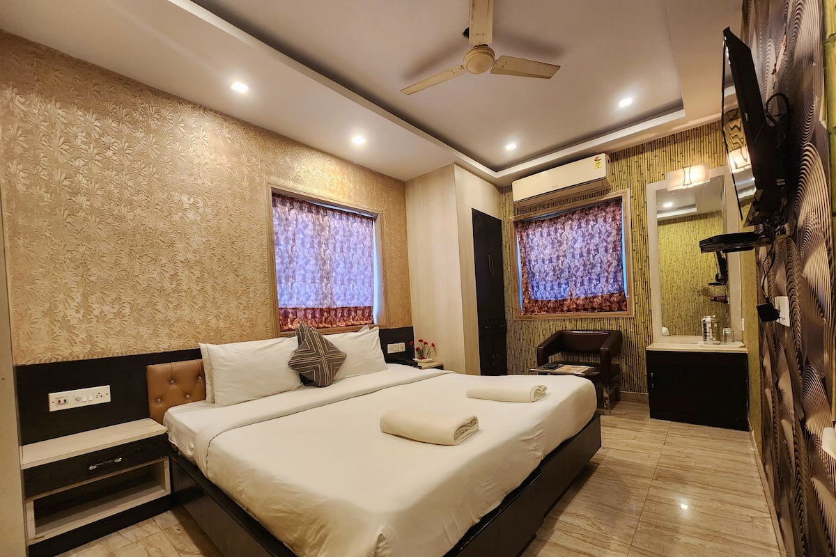 Quarto casal, vista para a cidade | Wi-Fi de cortesia, roupa de cama