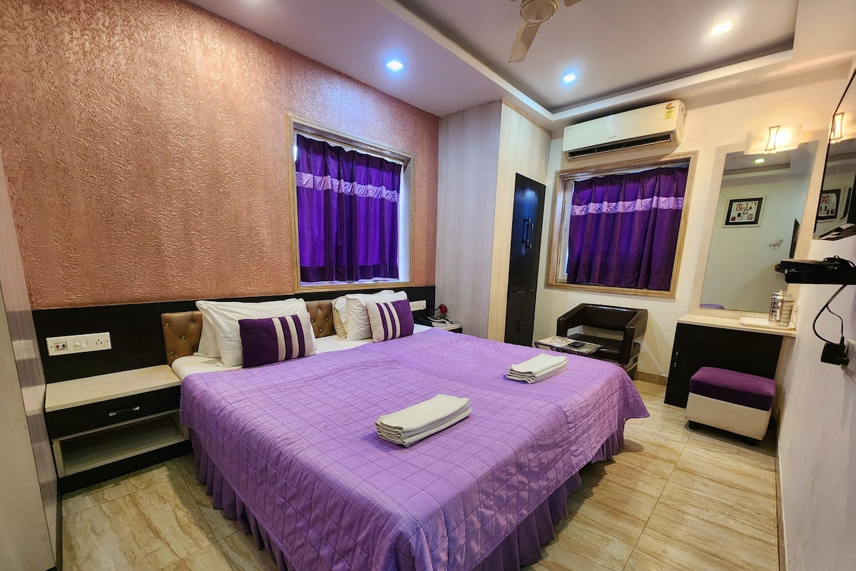 Quarto quádruplo, vista para a cidade | Wi-Fi de cortesia, roupa de cama