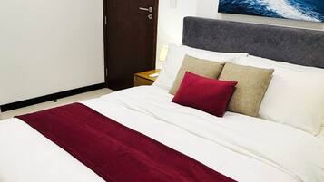 Luxury Apartment, 1 Bedroom, City View | Laptop workspace, blackout drapes, soundproofing, iron/ironing board
