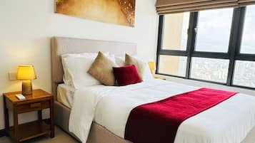 Luxury Apartment, 2 Bedrooms, City View | Laptop workspace, blackout curtains, soundproofing, iron/ironing board