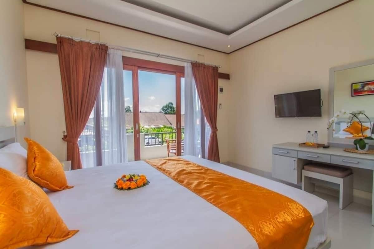 Family Room, Balcony, Garden View | Desk, laptop workspace, free WiFi