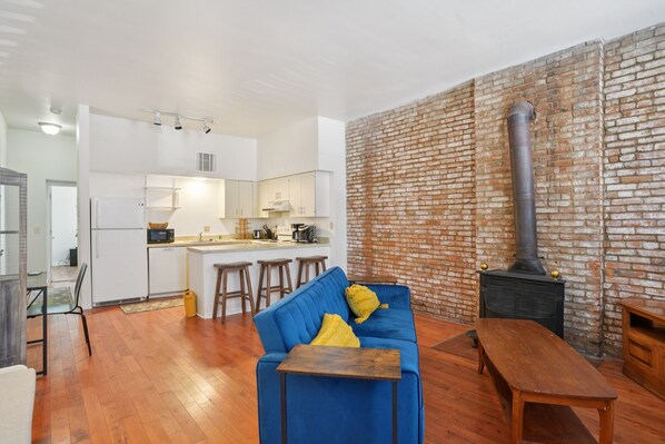 Apartment, 1 Bedroom | Living area | Smart TV - Charming Soulard Retreat With Historic Character 1 Bedroom Apts (St. Louis)