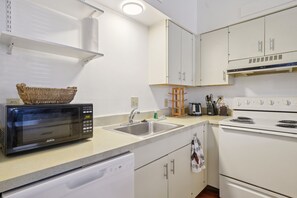 Apartment, 1 Bedroom | Private kitchen | Fridge, oven, coffee/tea maker, toaster - Charming Soulard Retreat With Historic Character 1 Bedroom Apts (St. Louis)