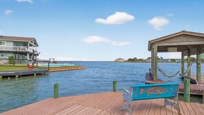 A wooden dock with a bench and a gazebo overlooking calm water. - The Blue Pearl Rp6 4 Bedroom Home (Rockport)