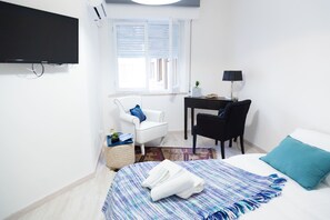 1 غرفة نوم ومكواة/لوح كي وواي فاي وملاءات أسرّة