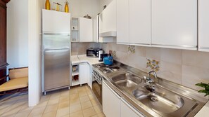 Fridge, oven, coffee/tea maker, toaster