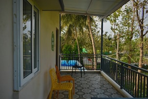 Classic Quadruple Room, Patio, Pool View | Balcony view