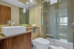 Shower, hair dryer, towels, soap