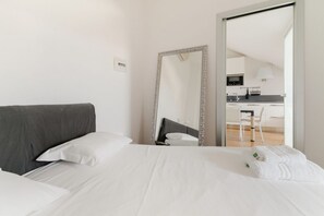1 slaapkamer, een strijkplank/strijkijzer