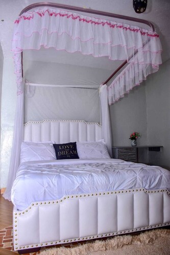 Charming 2-bedroom bed & breakfast with AC, fitness room in delightful Embu