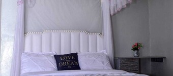 Charming 2-bedroom bed & breakfast with AC, fitness room in delightful Embu