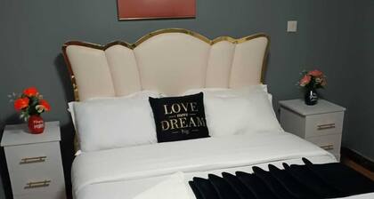 Charming 2-bedroom bed & breakfast with AC, fitness room in delightful Embu