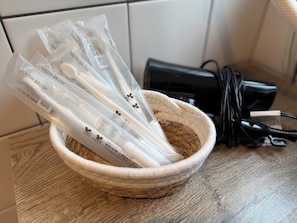 Hair dryer, towels, soap, toilet paper